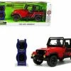 1992 Jeep Wrangler DV8 Off-Road With Extra Wheels, Red - Jada Toys 33851 - 1/24 Scale Diecast Car