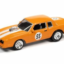 ModelToyCars 1985 Chevy Monte Carlo, Metallic Orange - Johnny Lightning JLSF018/48B - 1/64 Scale Diecast Car